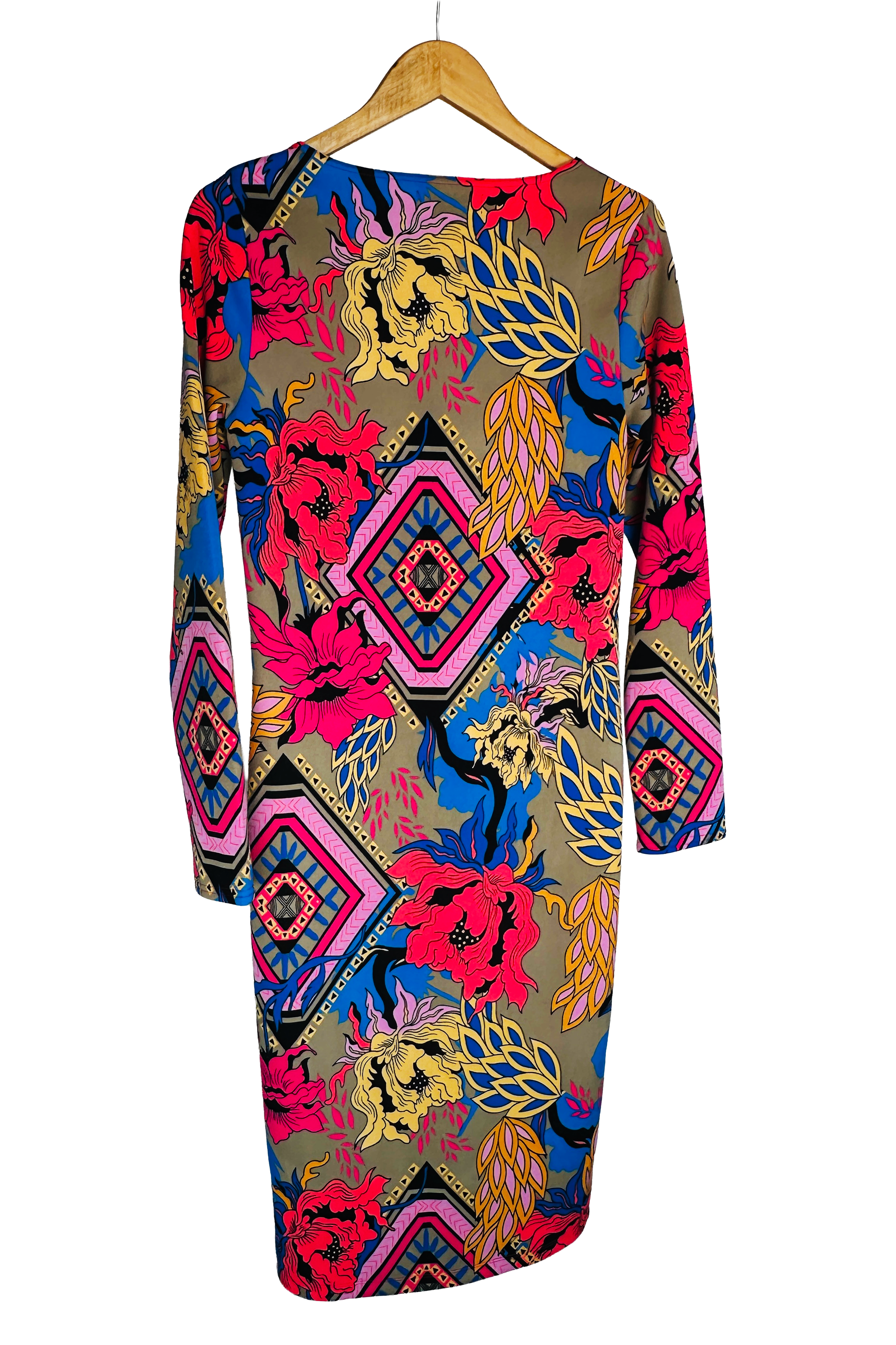Same dress, back view on a wooden hanger. Wide scoop back. Continuous mixed print of diamond medallions and large florals in red, pink, gold, and blue over an olive ground.