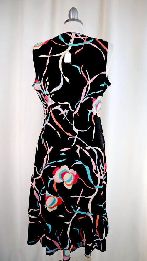 Black sleeveless dress with colorful floral pattern on a white background